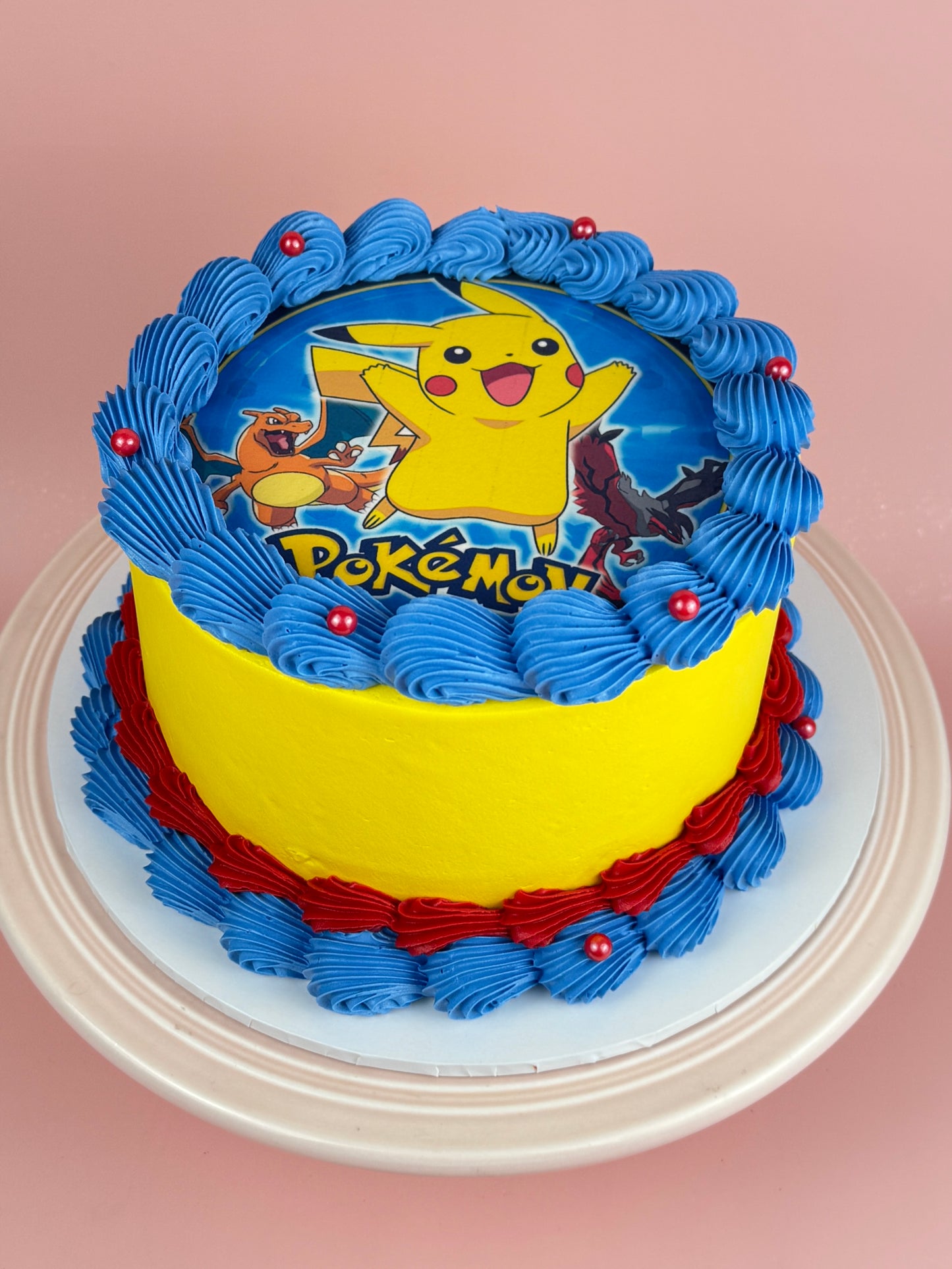 Cake with Pikachu and Pokémon graphics 