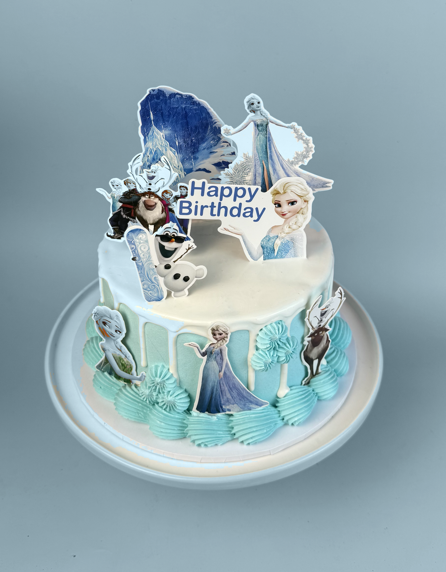 Elsa gelato cake with Frozen character toppers